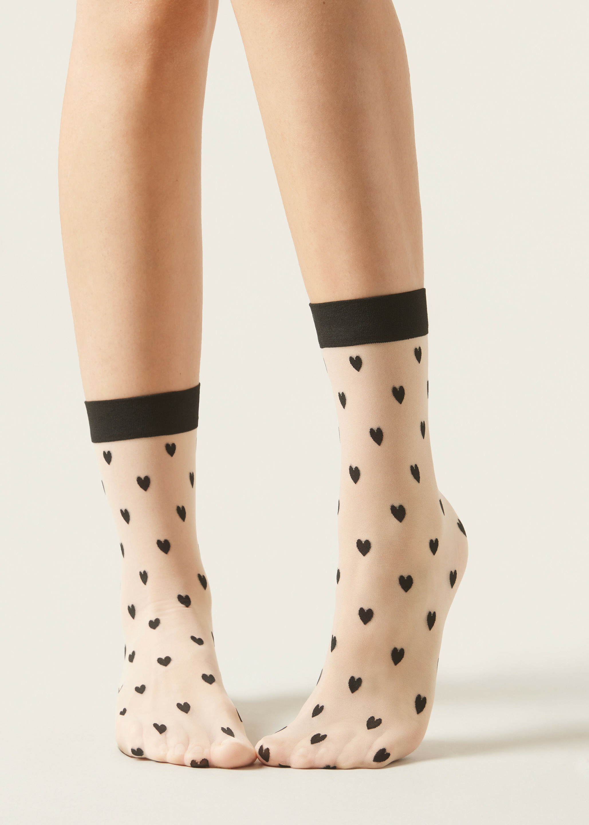 Chaussettes à motif cœurs intégral