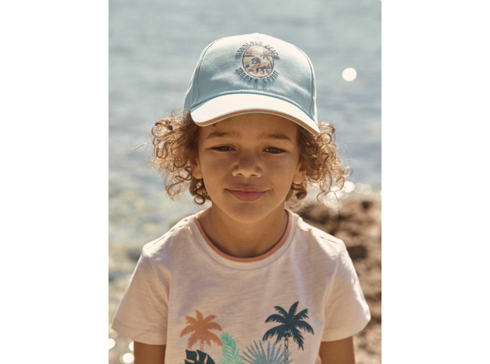 Casquette turquoise en twill à motif dinosaure
