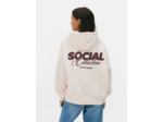 Sweat à capuche oversize à message