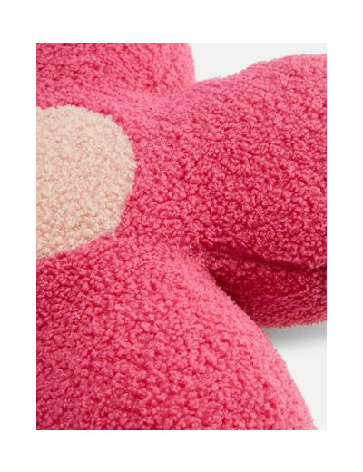 Coussin fleur en tissu bouclé