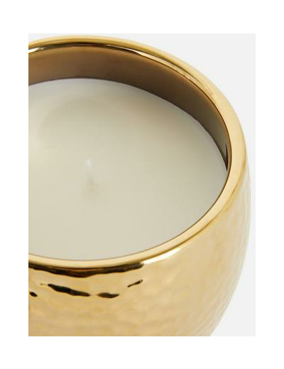 Bougie parfumée dans un pot en métal martelé