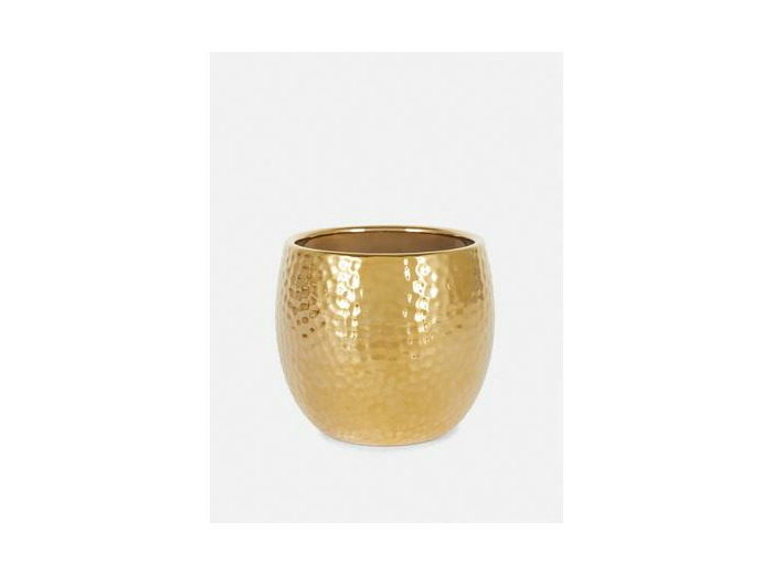 Bougie parfumée dans un pot en métal martelé