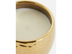 Bougie parfumée dans un pot en métal martelé