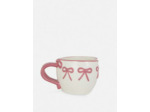 Tasse à motif nœuds en relief