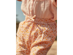Pantalon écru et orange en popeline à imprimé feuilles et fruits
