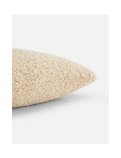 Coussin carré en tissu bouclé