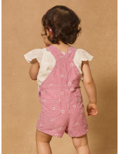 Salopette rayée avec fleurs brodées