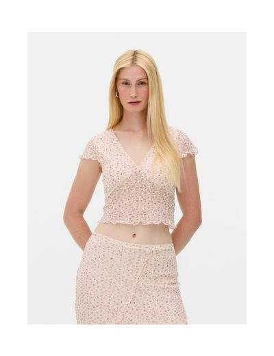 Haut à col en V et motif floral