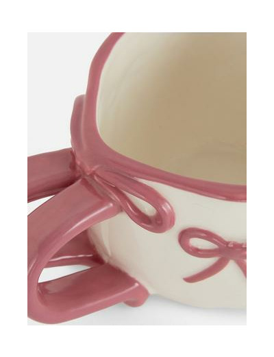 Tasse à motif nœuds en relief