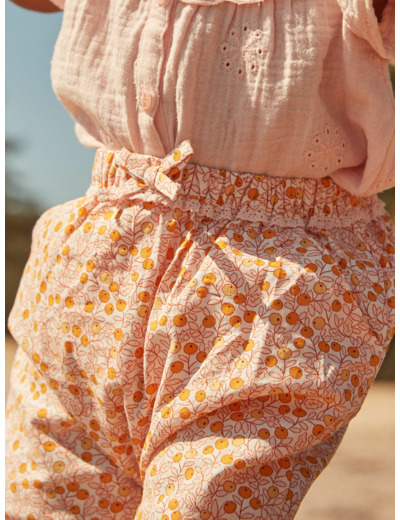 Pantalon écru et orange en popeline à imprimé feuilles et fruits